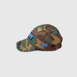 Ausenseiter Camo Cap Left Side View showing Blue OT7 Logo and ARMY Embroidery